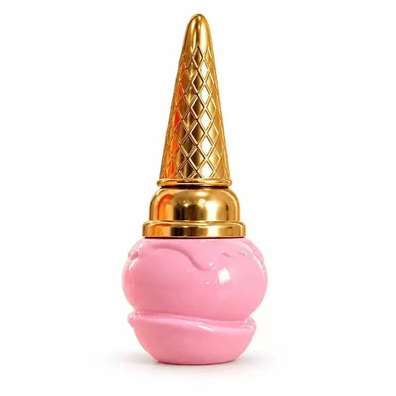A pink and gold novelty perfume bottle shaped like an ice cream cone, set against a plain white background.