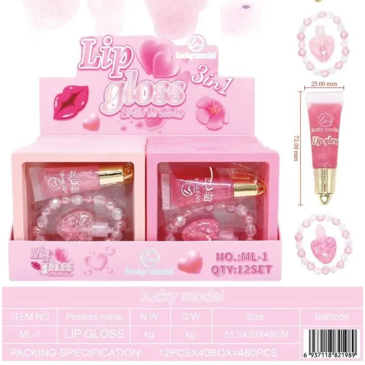 Pink lip gloss set with two small gloss bottles, matching pink lip gloss tubes, heart-shaped sponges, and pink beaded accessories, shown in retail packaging on a white background with text overlays.