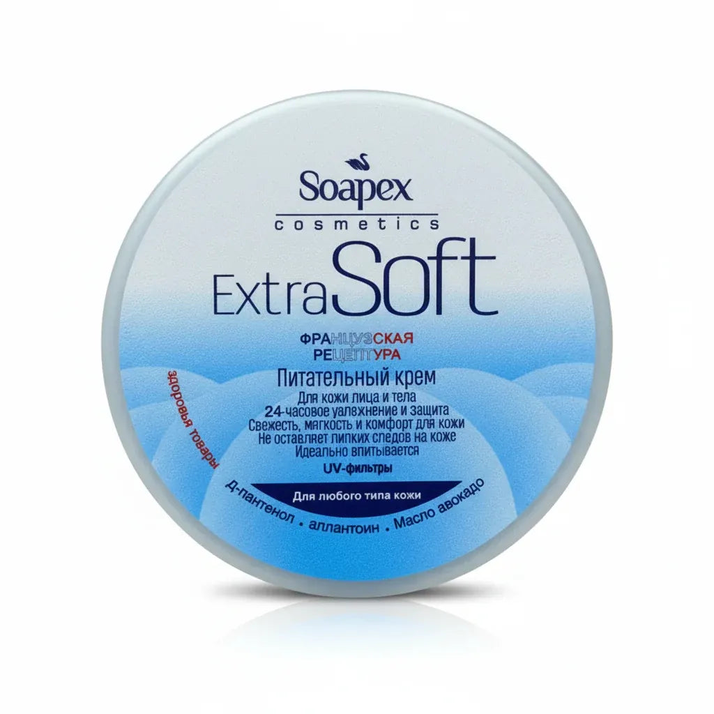 A round white plastic jar of Soapex Cosmetics Extra Soft moisturizing cream, featuring a blue gradient label with Russian text, set against a plain white background.