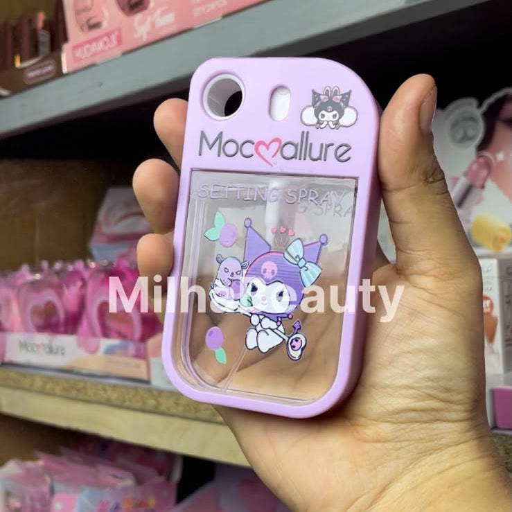 Hand holding a pink phone case with 'Mocca allure' branding in a store setting.