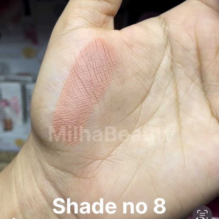 A close-up of a hand showing a swatch of blush makeup on the back of the palm, with text overlays reading 'Price 150/- each' and 'Shade no 8 For order www.MilhaBeauty.