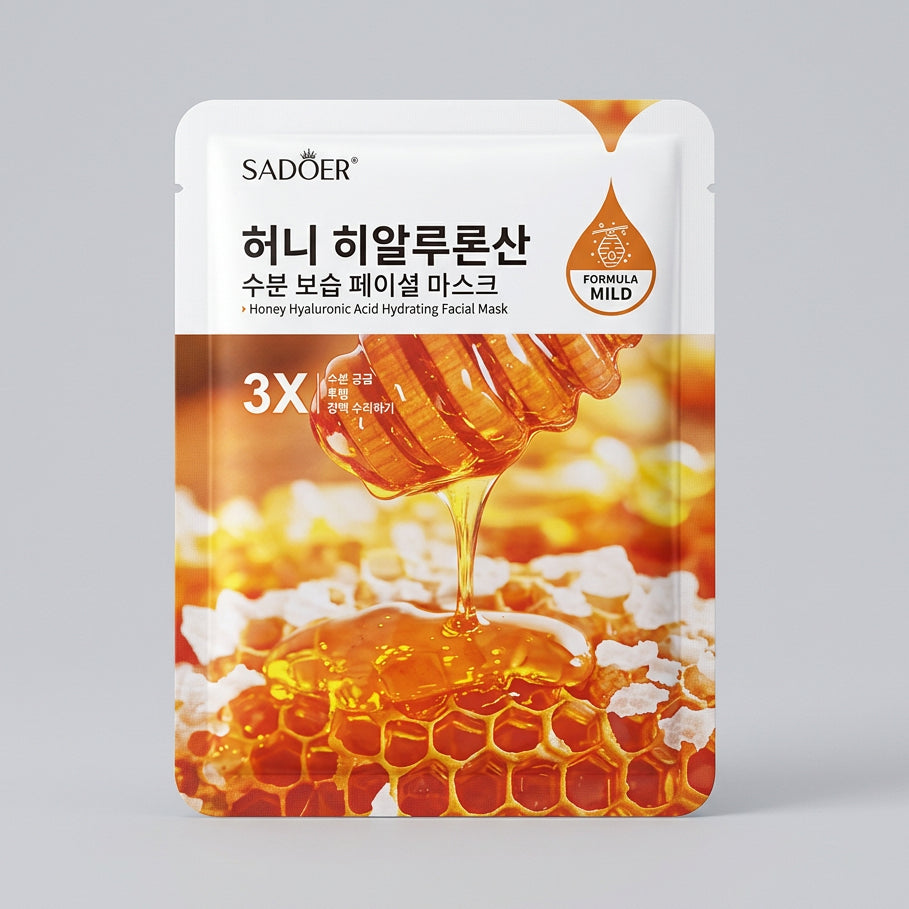 A packet of SADOER Honey Hyalu潤san Humidifying Mask placed on a beige patterned fabric surface. The packaging features a honey dipper pouring honey over a honeycomb pattern.