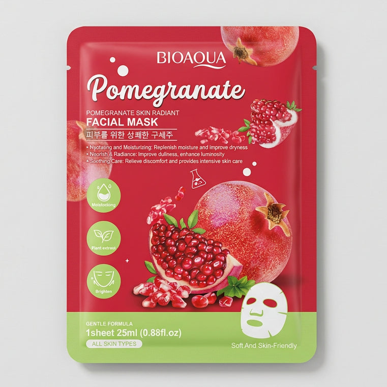Bioaqua Pomegranate Facial Mask in a pink and green pouch, placed on top of a black laptop keyboard.