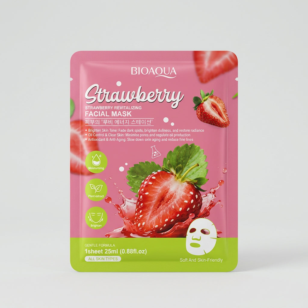 A pink BioAqua Strawberry Facial Mask pouch with a strawberry illustration and a white sheet mask shown, placed on top of a laptop keyboard.
