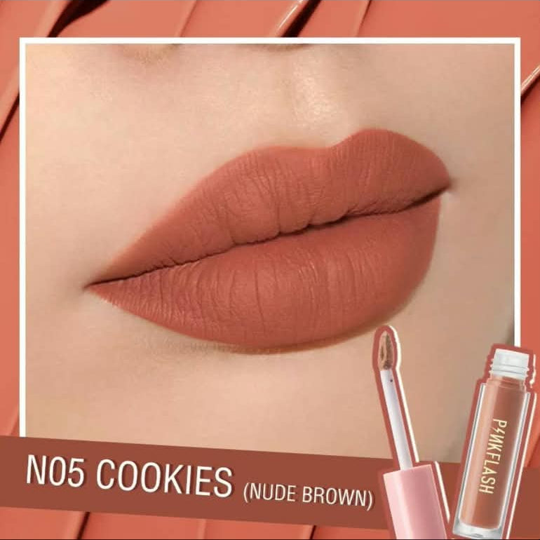 A close-up lip swatch showing nude brown lipstick applied to lips, with the tube and applicator visible at the lower right and text reading 'N05 COOKIES (NUDE BROWN)'.