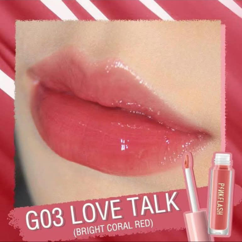A close-up lip swatch showing glossy coral-red lips with text reading 'GO3 LOVE TALK (BRIGHT CORAL RED)', alongside a small tube of lip gloss on a pink striped background.