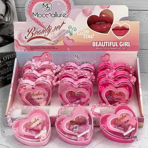 Moolallure Beautiful Girl makeup set packaging with pink heart-shaped containers on a wooden surface.