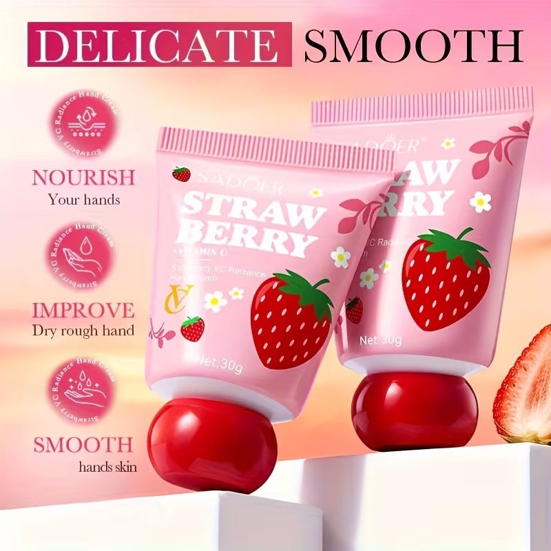 Strawberry-themed hand cream packaging with text and icons on a pink background