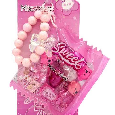 Pink children's jewelry set with packaging featuring cartoon characters on a white background