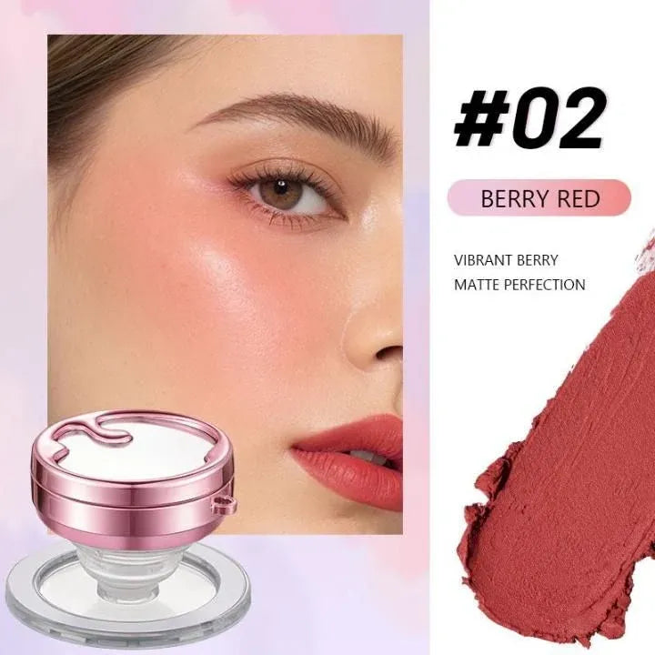 Matte blush stick in shade #02 Berry Red, featuring a model with pink cheeks, a textured product swatch, and the compact with its pink metallic lid and clear stand.