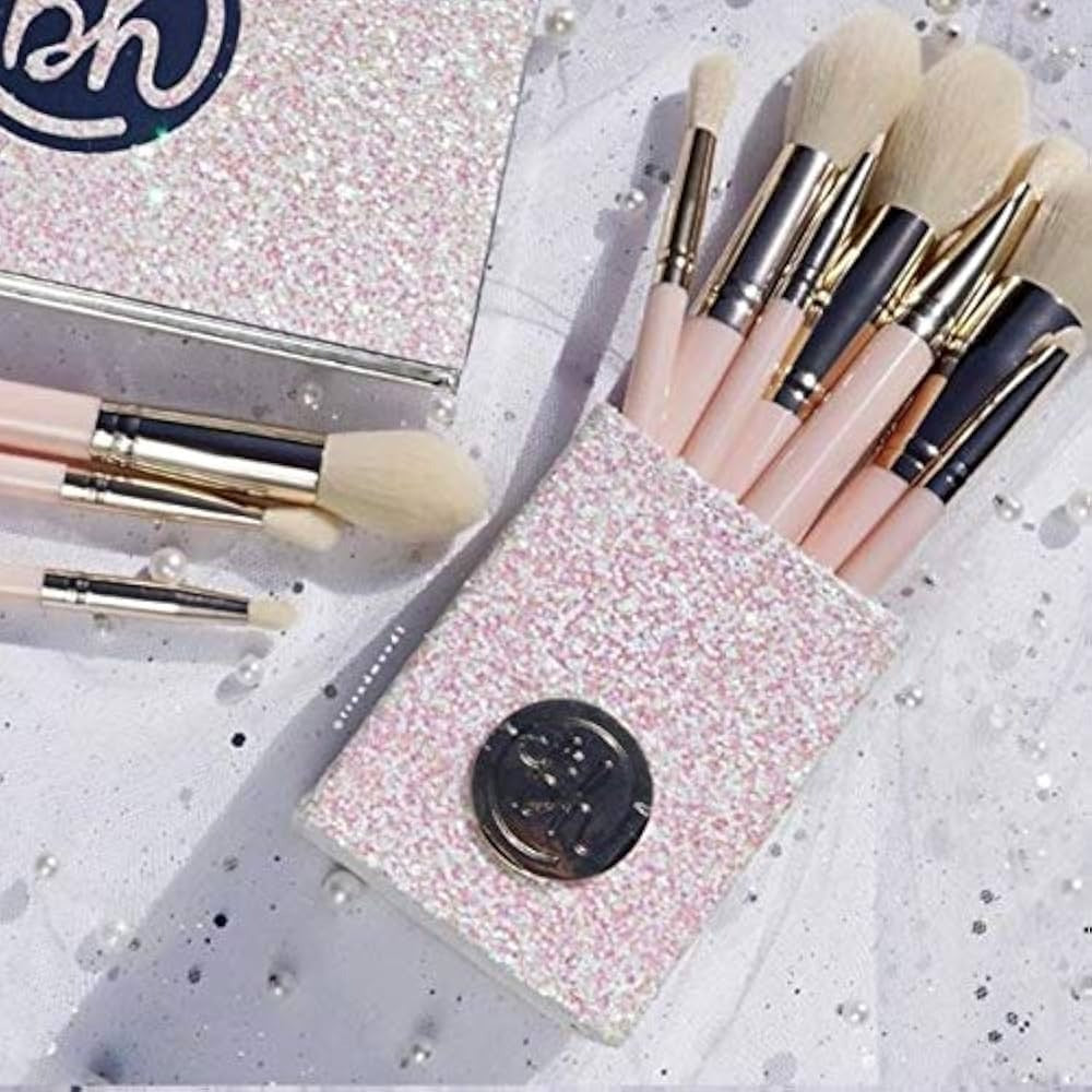 BH  makeup brushes in a glittery case on a sparkly background