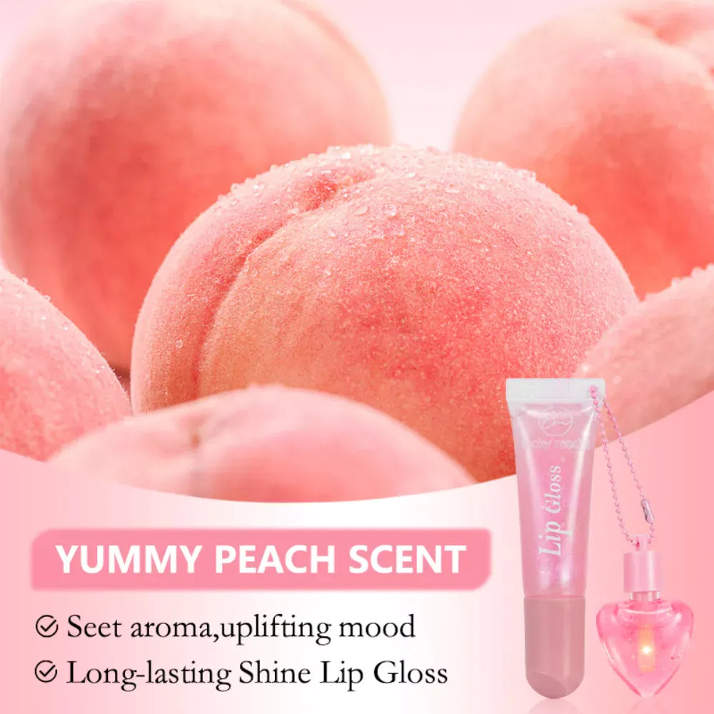 Peach-flavored lip gloss tube and matching heart-shaped perfume bottle on a pink background with peach fruit imagery and text reading 'YUMMY PEACH SCENT'.