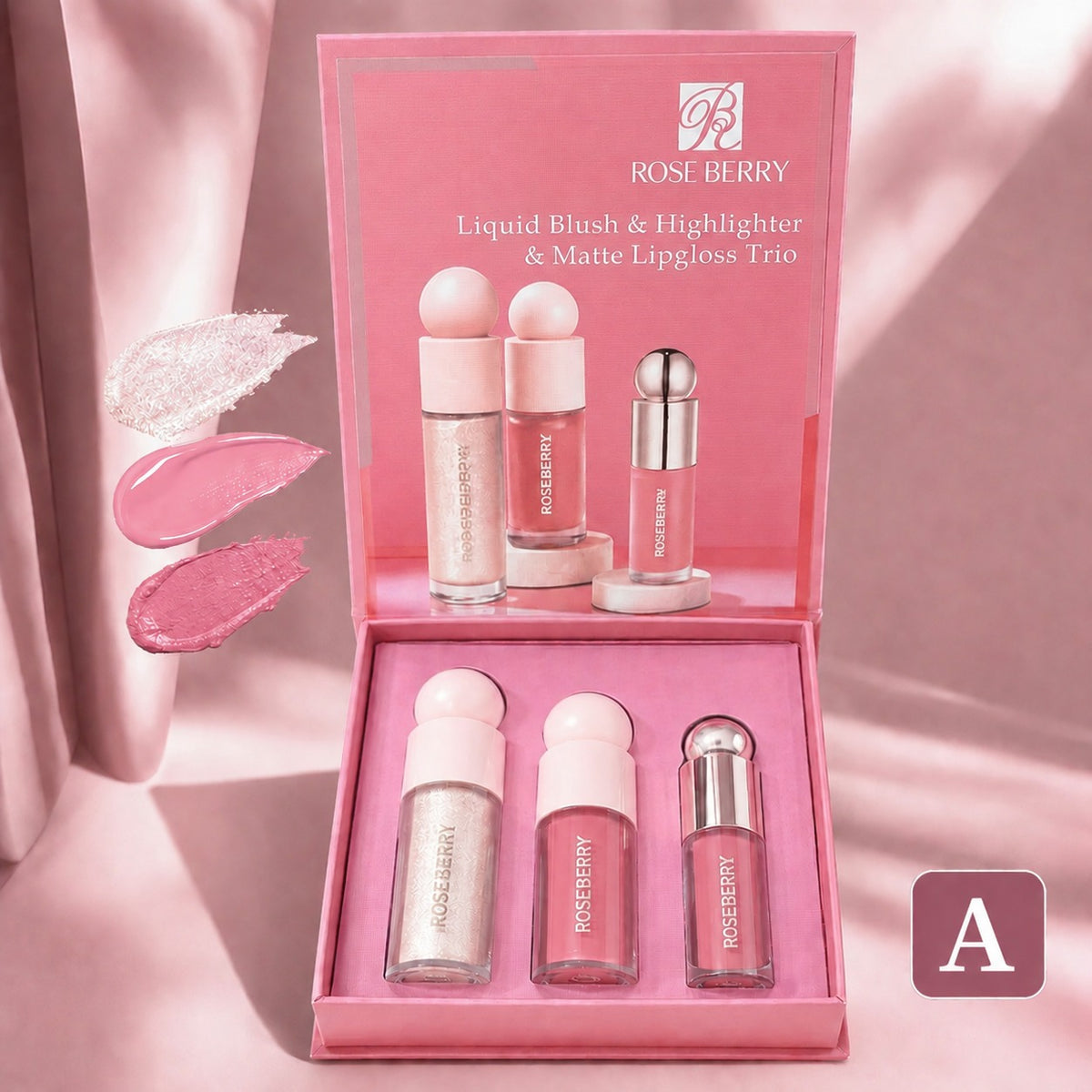 Rose Berry Liquid Blush & Highlighter & Matte Lipgloss Trio in a pink presentation box, with three lip products displayed inside and three pink shimmer swatches shown on the left against a soft pink draped background.