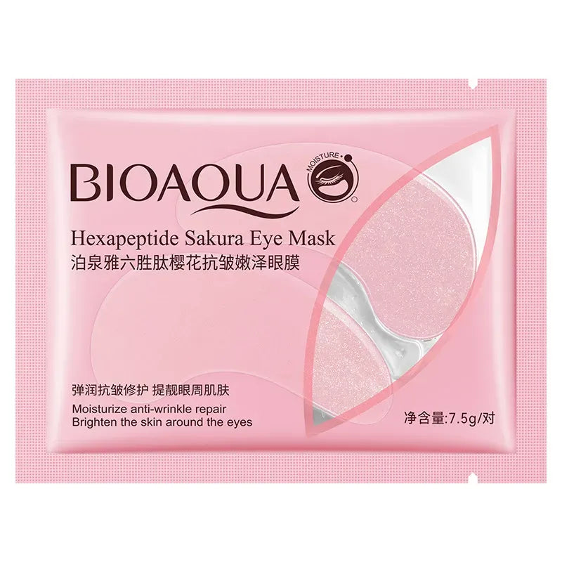 BIOAQUA Hexapeptide Sakura Eye Mask packaging in pink, showing two oval-shaped eye patch inserts inside a sealed foil packet.