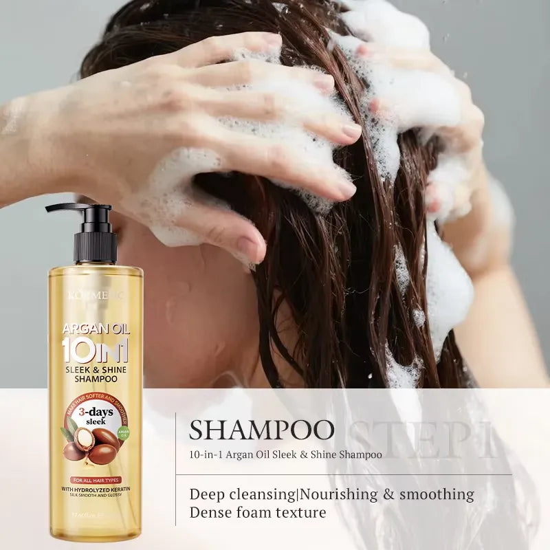 A bottle of Komeo Argan Oil 10ml Sleek & Shine Shampoo is shown next to a lifestyle image of a person washing their dark brown hair with thick white foam. Text overlays describe the shampoo as deep cleansing, nourishing, and smoothing.
