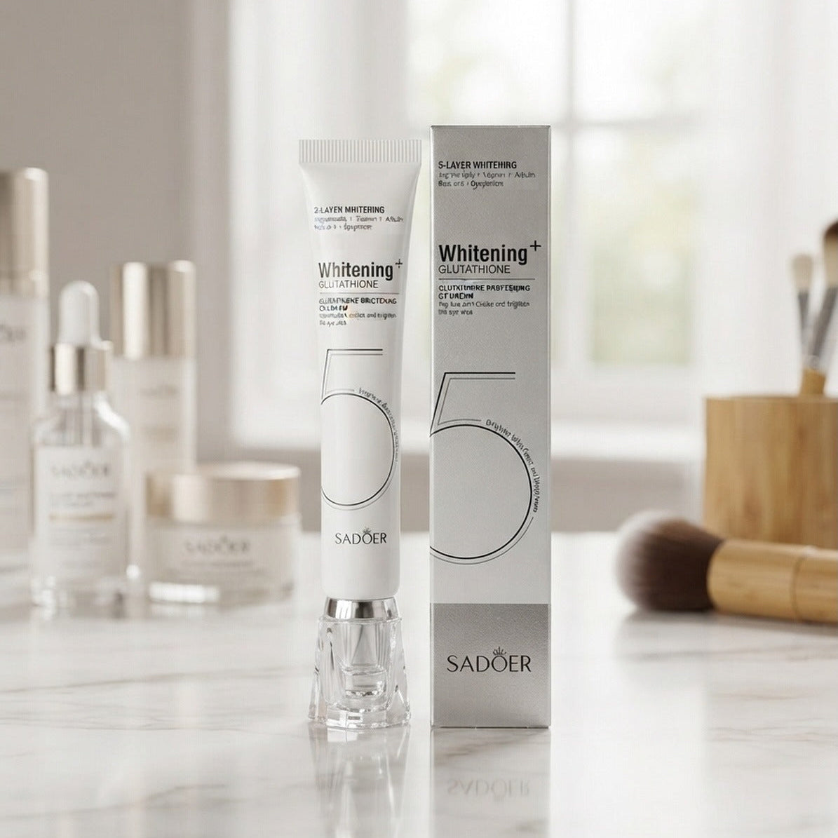 Sadoer 55 Whitening + Laser Whitening tube and box displayed on a marble countertop with cosmetic bottles and brushes in a softly lit room.