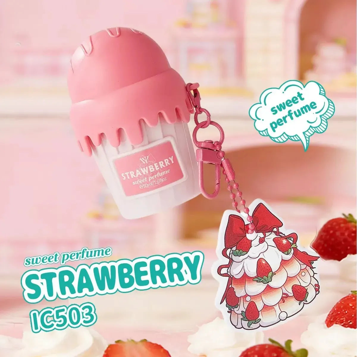 A pink strawberry-themed perfume bottle-shaped keychain charm with a matching acrylic keychain tag, shown against a soft pink blurred background with strawberries and decorative text reading 'sweet perfume STRAWBERRY IC503'.