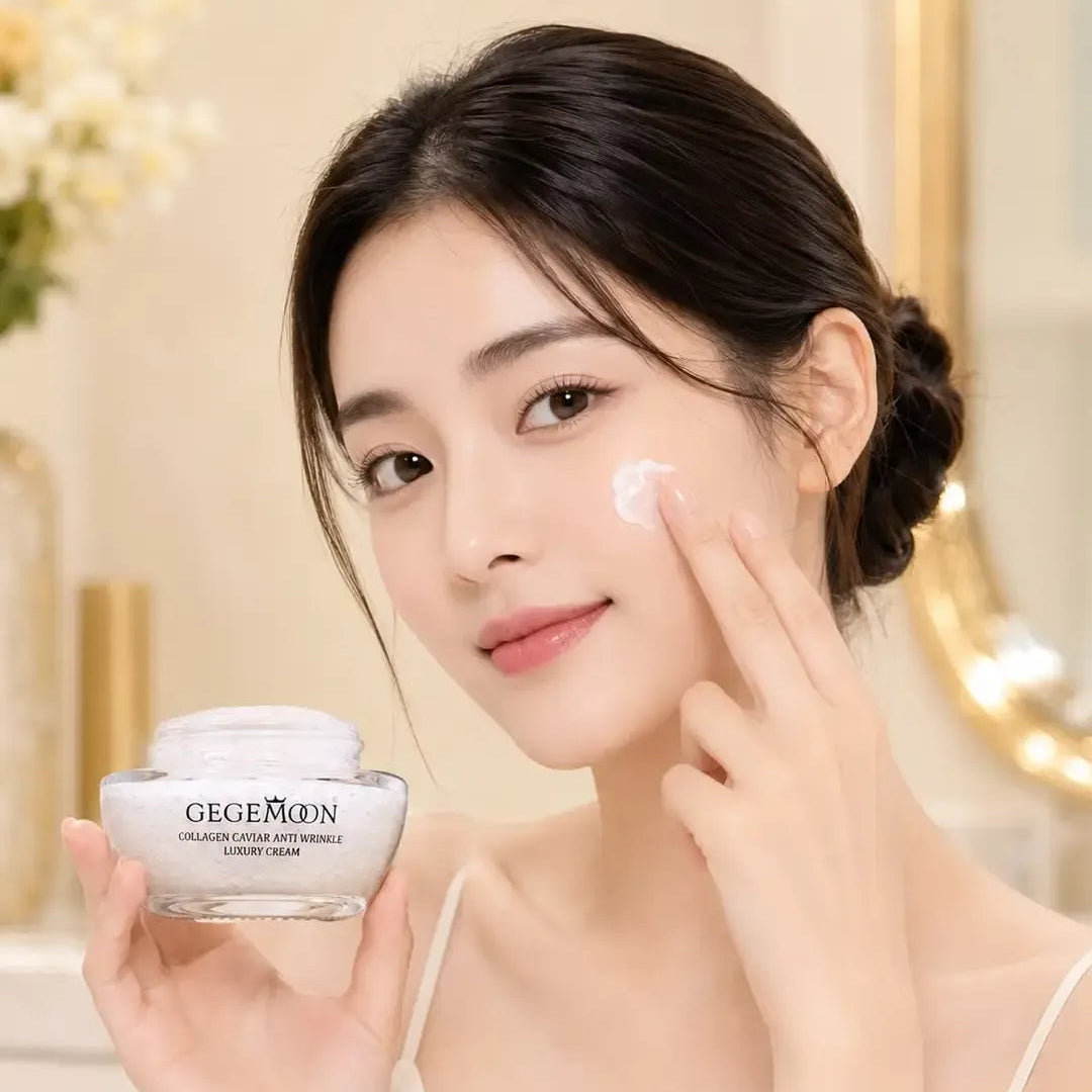 A woman with dark hair in a bun applies cream to her cheek while holding a jar of GEEGMON Cleansing Cream in a bright, elegant bathroom setting.
