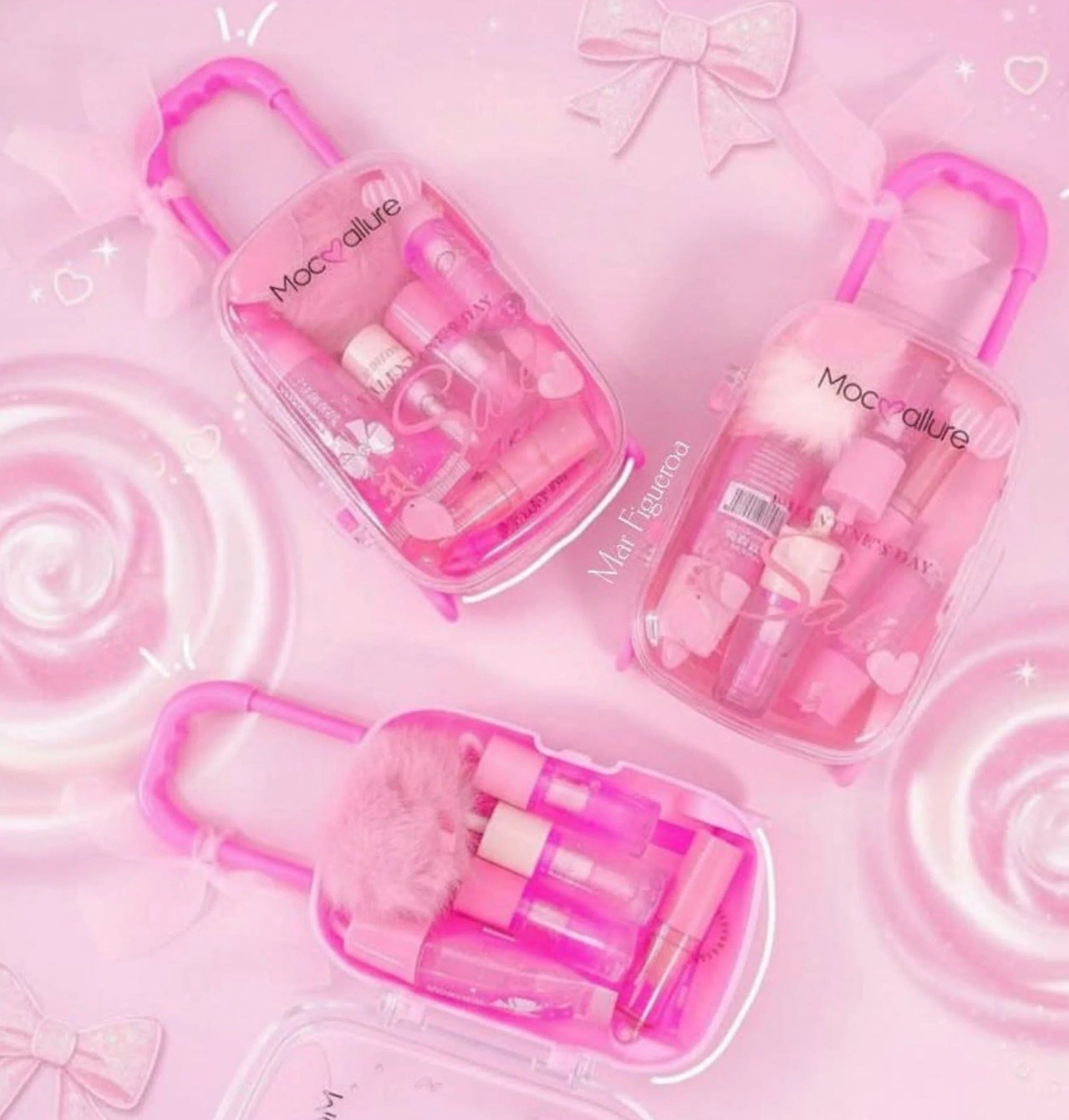 Set of pink cosmetic products with visible branding on a pink background