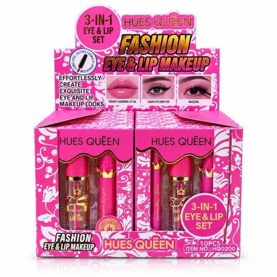 Hues Queen Fashion Eye & Lip Makeup 3-in-1 set in a pink retail display box with two lip oil tubes visible in each compartment.
