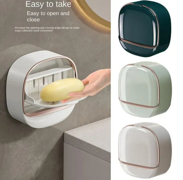 Wall-mounted soap dispenser holder shown in use with a bar of soap, alongside three color variants on a clean white background. Text on the left says it is easy to take, easy to open, and easy to close.