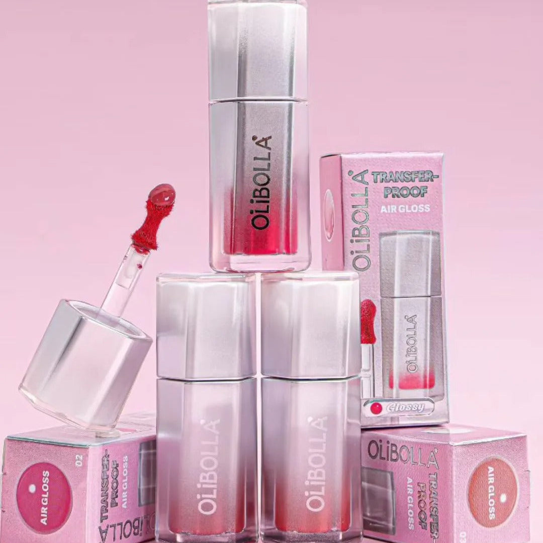 OliBoula lip gloss products on a pink background
