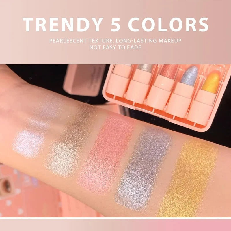 Makeup swatches on a arm with a compact case labeled 'Trendy 5 Colors'.