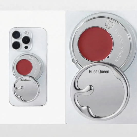 A Hues Queen brand silver magnetic phone case shown on a white phone, alongside close-up views of the circular silver case components revealing a red pressed powder blush or lip color insert. The case includes engraved text reading 'Hues Queen' and 'LOVE HUES QUEEN'.