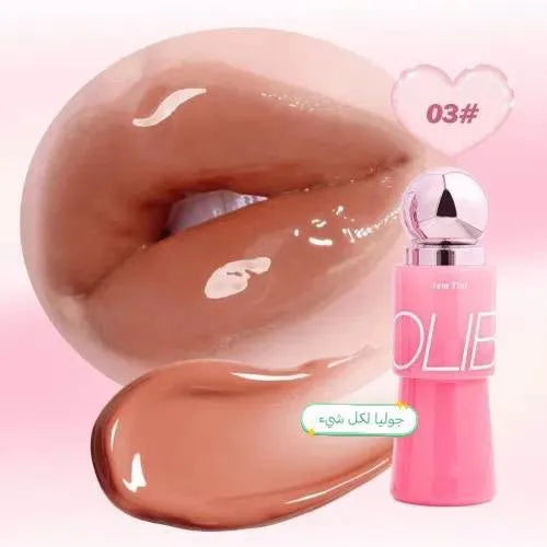 A glossy nude-brown lip color shown on lips, with a smear of the product below and a pink cosmetic bottle labeled OLIB on the right. A heart-shaped label reads 03# and there is Arabic text near the product.