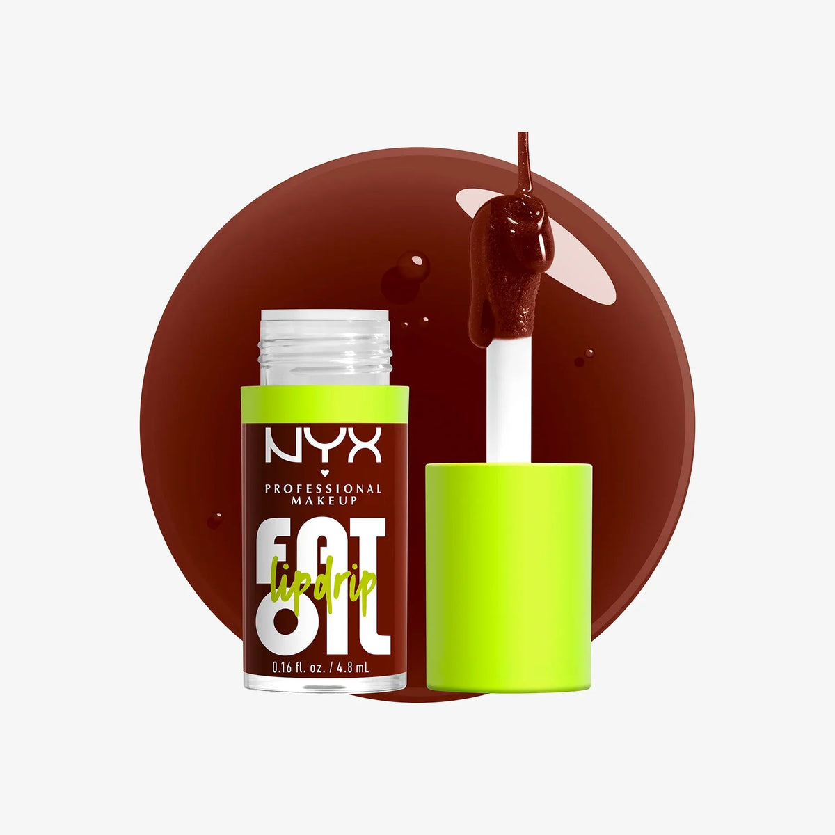 NYX Professional Makeup Eat It Up cream makeup stick shown with its bright lime green cap removed and the applicator wand, set against a glossy dark brown makeup smear on a light gray background.