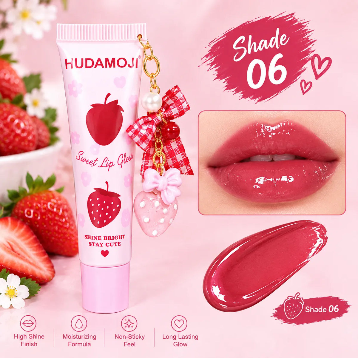 Hudamojo Sweet Lip Gloss tube in shade 06, shown alongside a close-up of glossy pink lips wearing the product, a lip gloss smear, strawberries, and feature icons on a pink background.